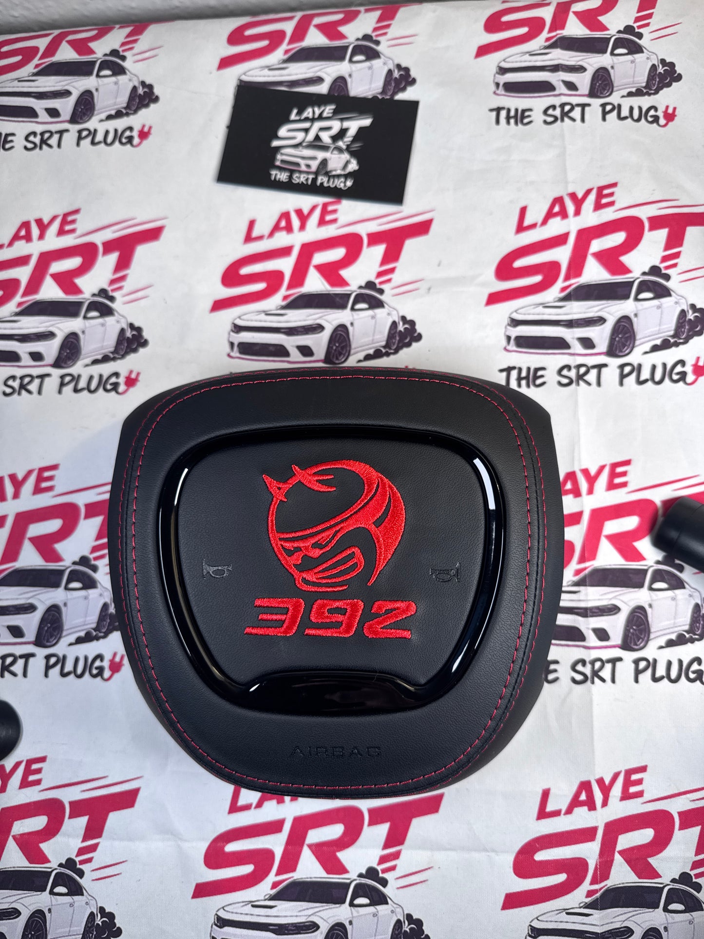 Angry bee 392 leather airbag cover with red stitching
