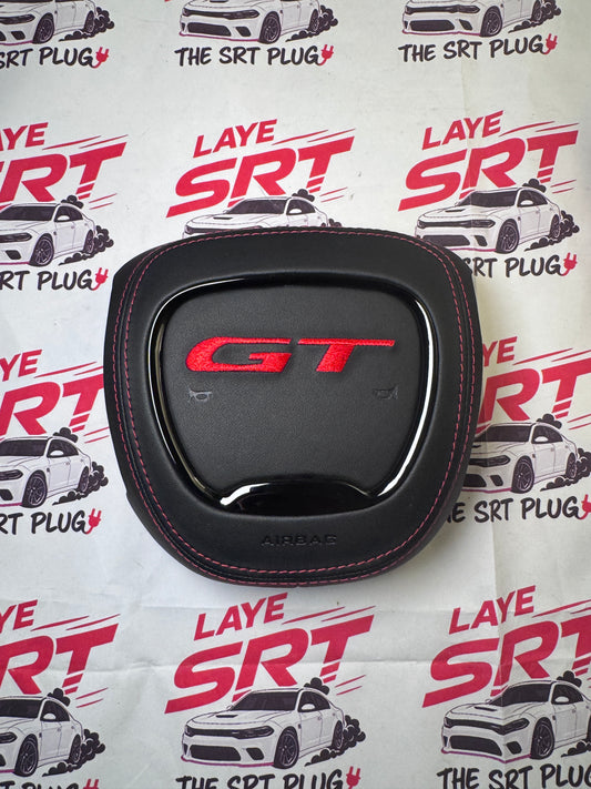 GT leather airbag cover with red stitching